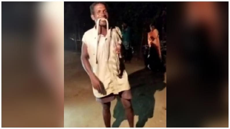 Odisha man bites snake